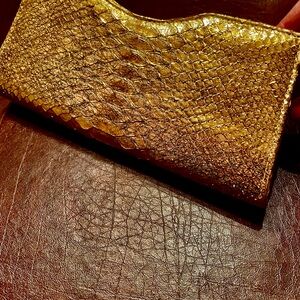Elegant Gold Textured Clutch
